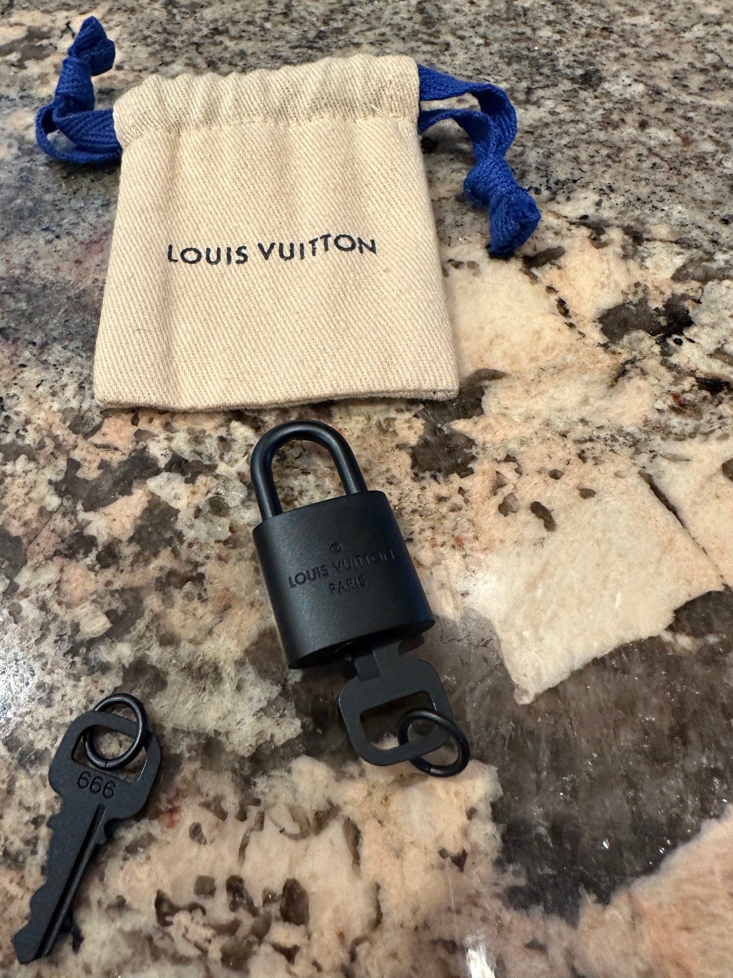 Louis Vuitton Rare Black Lock pendant for necklaces